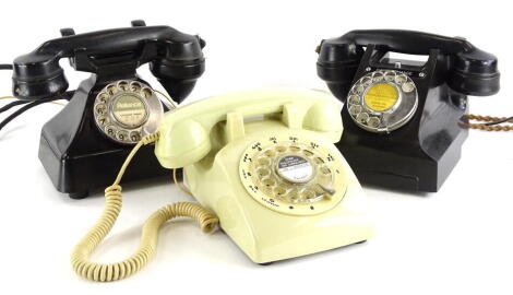 Three vintage telephones, G.P.O black Bakelite telephone, with call exchange, another similar stamped Reliance to the dial and a cream plastic telephone, labelled model STP 1960. (3)