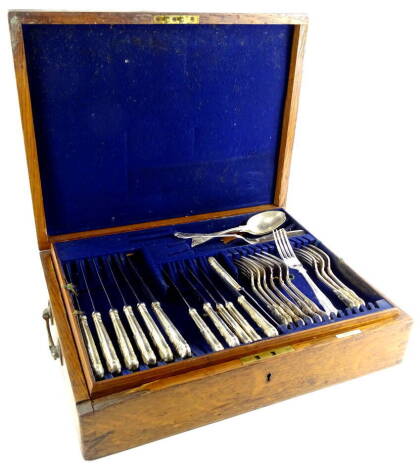 An early 20thC oak canteen of cutlery, the canteen marked Elkington & Co, Kings pattern, part settings for six with extra pieces, the canteen 12cm high, 48cm wide, 37cm deep.