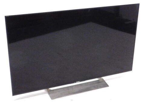 A Sony Bravia 4K 49 inch Android TV, with original box.