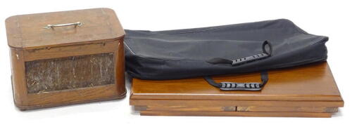 An eastern hardwood portable lectern or writing box, with hinges to end, canvas carrying case, 48cm wide, and an eastern hardwood foodbox, with metal grills and chrome plated handle, 37cm wide, (2).