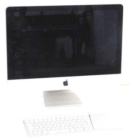 An Apple IMac, with 21.5 inch screen, 4GB RAM, 500GB hard drive track pad, with wireless keyboard.