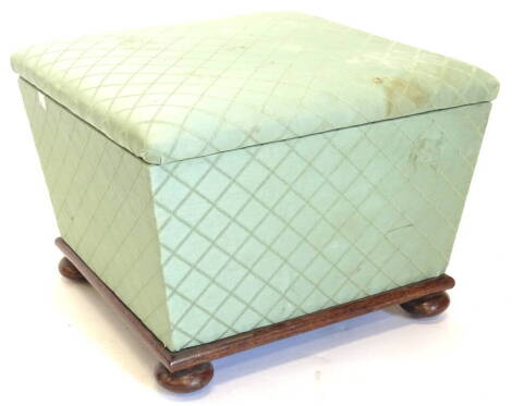 A Victorian mahogany Ottoman, upholstered in turquoise geometric pattern fabric, the hinged lid enclosing a vacant interior, on bun feet, the top 47cm x 49cm.