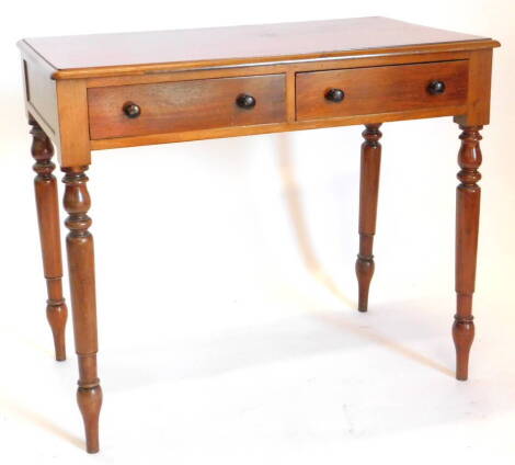 A Victorian mahogany side table, the rectangular top with a moulded edge, above two frieze drawers on turned tapering legs, 89cm wide, 51cm deep.