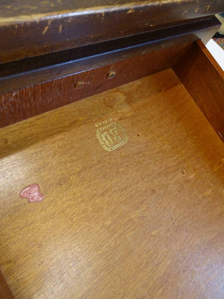 A 1960's GPlan mahogany coffee table designed by E Gomme, the