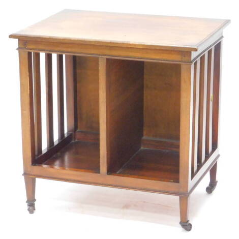 A late 19th/early 20thC mahogany Canterbury or folio stand, the rectangular top with a moulded edge, on plain slatted supports, with square tapering legs and metal castors, 61cm wide.