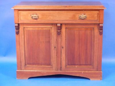 A late Victorian walnut chiffonier base