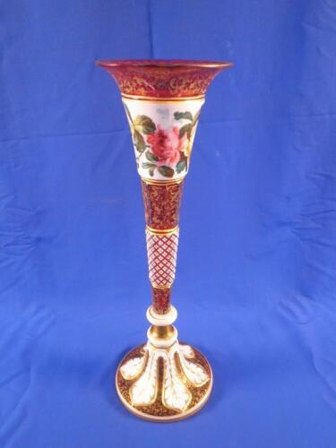 A Bohemian pink and white overlay glass trumpet shaped vase