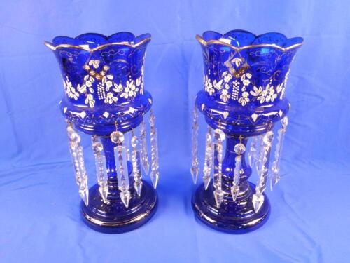 A pair of Victorian blue glass table lustres