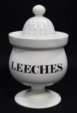 A late 18thC creamware Leeches jar and cover, possibly Leeds, of baluster form, with a pierced lid, 31cm high. (AF)