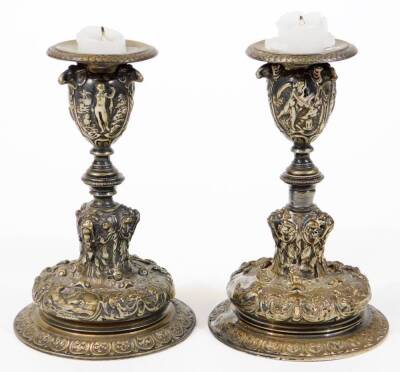 A pair of Elkington electroplate candlesticks, model 415, cast with female figures and C scrolls, 13.5cm high. - 2