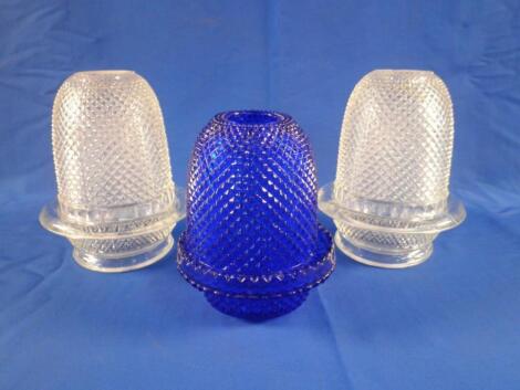 A pair of George Davidson clear moulded glass night lights and