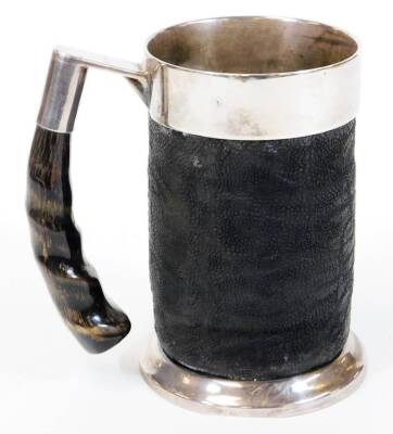 A tankard, of cylindrical form, with metal mounts, horn handle and textured body, marked SPC, 15cm high and an Art Deco silver plated cocktail shaker. (2) - 5