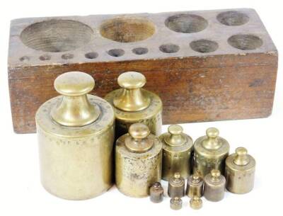 A set of Victorian brass and mahogany postal scales with weights, and a further oak block of weights. (2) - 5