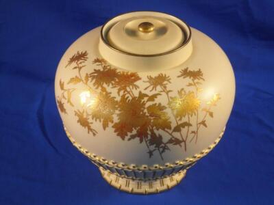 A Royal Worcester pot pourri jar and cover decorated with chrysanthemum