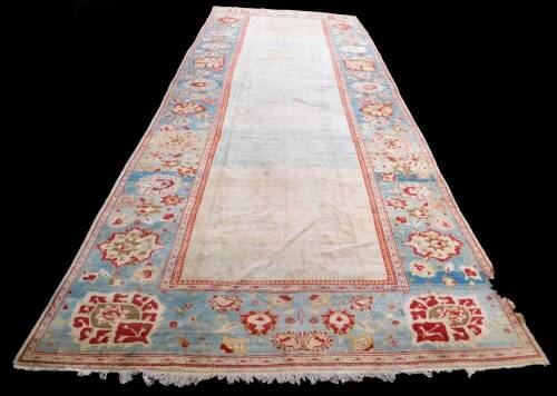 A fine and large antique rug or carpet, possibly Ziegler, 886cm x 348cm.