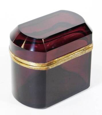 An early 20thC amethyst coloured glass casket, of oblong form, with hinged lid, metal mounts and plain interior, 14cm high, 15cm wide, 9cm deep. - 2