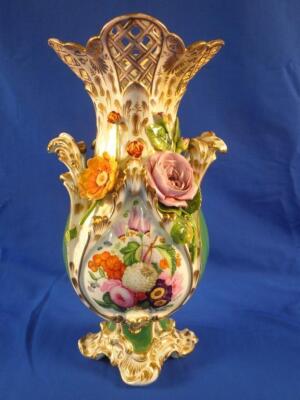 A mid-early 19thC Coalport flower encrusted porcelain vase