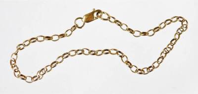 A 9ct gold curb link child's bracelet, 17cm long overall, 1.7g.