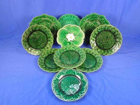 A set of five Wedgwood type green leaf moulded plates