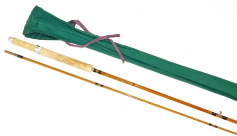 A C.C Lightheight two piece split can fly rod, by Constable of Bromley, with snake rings and black whippings, cork handle with aluminium furnishings, 276cm, with cloth bag.