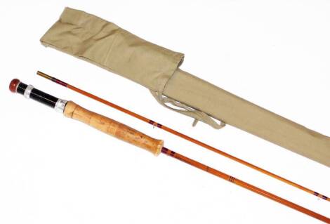 A Hanford two piece split can fly rod, by Marcus Warwick, of Uppingham Rutland, with snake eyes and red whippings, shaped cork handle and aluminium furnishing, screw in rubber butt, no. 6, 275cm, with cloth bag.