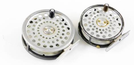 A Hardy Bros Ltd Marquis fly reel, no.8/9, 6.5cm diameter, and a Hardy Bros Ltd LRH Lightweight fly reel, 8cm diameter. (2)