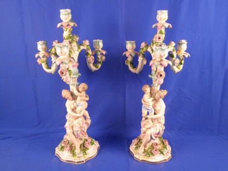 A pair of late 19thC Dresden porcelain candelabra