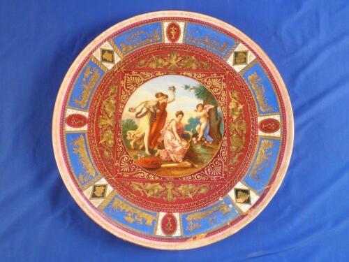 A late 19thC Dresden plate decorated in the Vienna style with three Neo-classical