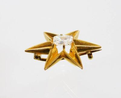 A Victorian diamond set star brooch, set with single old cushion cut diamond, in six point claw setting, 7.56mm x 7.13mm x 3.23mm, totalling approx 1.3cts overall, the diamond in a yellow metal six point star frame, yellow metal, unmarked, with single pin - 5