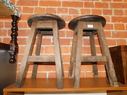 A pair of rustic oak stools.