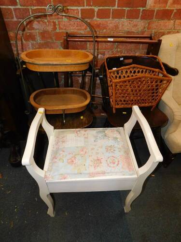 A cream painted piano stool, two kitchen chairs, a towel rail, two tier stand, cane magazine rack and a four fold firescreen. (7)