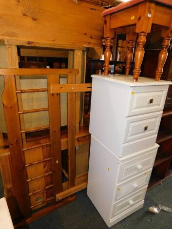 A cream painted three drawer bedroom chest, 45.5cm wide, two drawer bedside chest, 42cm wide, upholstered pine stool and a pine double headboard. (4)