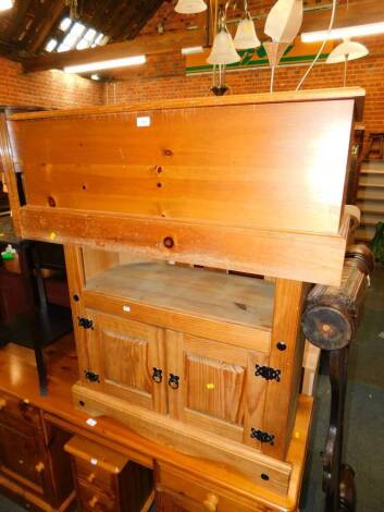 A pine toy chest, 101cm wide, 41cm deep, together with a pine cabinet, 85cm wide. (2)