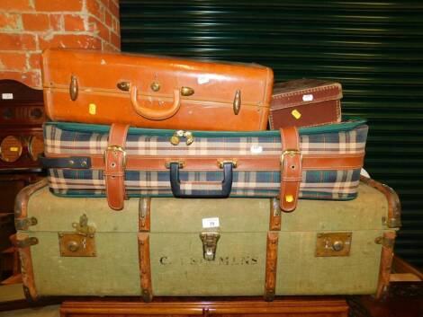 A wooden bound canvas trunk, bearing railway luggage labels, 91cm wide, Unicorn suitcase, tan leatherette case and two school cases. (5)