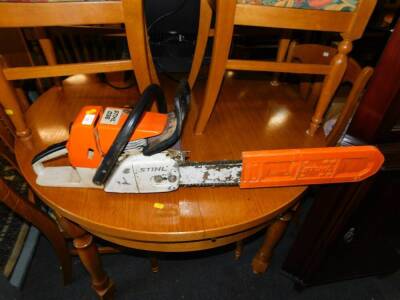 A Stihl 036 model chain saw.