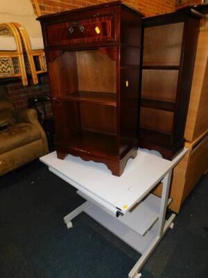 A mahogany two shelf bookcase, 48cm wide, together with a further bookcase 45.5cm wide, a computer desk, and a three drawer filing cabinet, 40cm wide. (4)