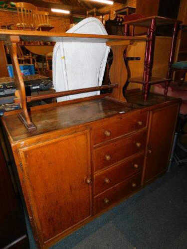 A Utility Period oak sideboard, with four drawers flanked by cupboards, 137cm wide, rectangular oak occasional table raised on trestle end supports, 100.5cm high and a mahogany two tier side table, 34.5cm diameter, 65cm high. (3)