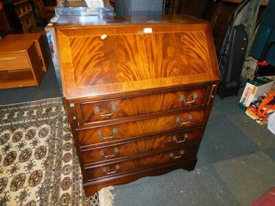 A Georgian style mahogany bureau, 99cm high, 76cm wide.