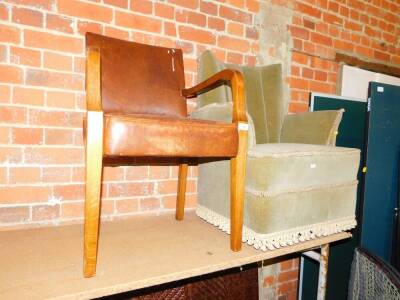 An oak framed open armchair with leatherette seat and back, together with a nursing chair upholstered in green fabric. (2)