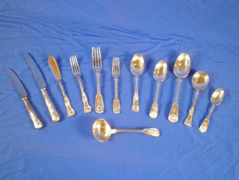 A set of silver fiddle thread and shell pattern cutlery