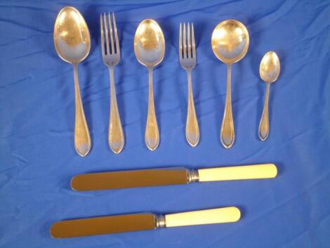 A set of Sandringham pattern silver cutlery comprising 12 soup spoons