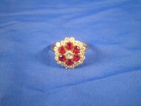 A ruby and diamond cluster ring