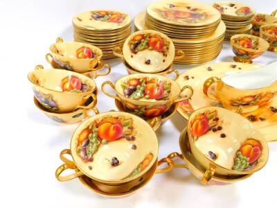 An Aynsley porcelain part dinner and tea service, decorated in the Orchard Gold pattern, comprising oval meat platter, sauce boat, eleven dinner, six dessert and eight side plates, twelve soup cups and saucers, six tea cups and saucers. - 3