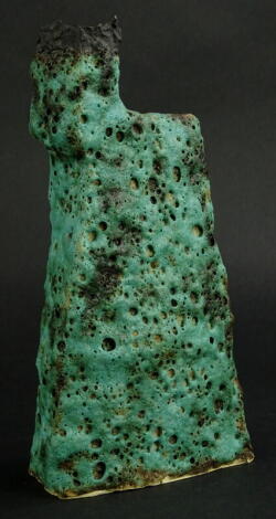 Martin Pearce. A studio pottery biomorphic style vase, of slab form with all over turquoise lava type glaze, monogram mark to underside, 19cm high. Provenance: The Dayabandhu Collection