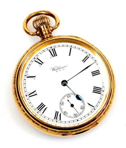 A 1920's 9ct gold cased open face pocket watch, the 4.5cm Roman numeric dial with subsidiary Arabic second hand marked Waltham USA, in tooled case with manual movement, 7cm high, 96g all in.