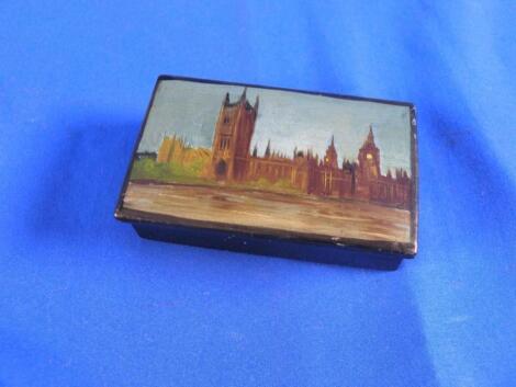 A Victorian papier mache snuff box