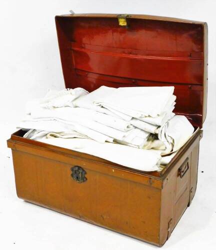 An early 20thC tin trunk, with domed top and rectangular body, 46cm high, 68cm wide, 51cm deep containing a quantity of early 20thC linen, some possibly Irish, worked examples, table pieces, etc. (a quantity)