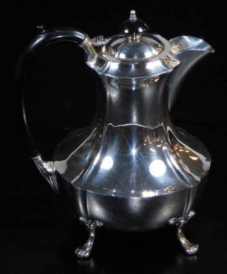 A 20thC Hegworth silver plated four piece service, comprising coffee pot, 23cm high, teapot, two handled sugar bowl and milk jug, each of shaped form on quadruple paw feet, and a silver plated box. (a quantity) - 2