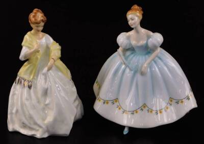 A Royal Worcester Doughty figure First Dance 3629, 16cm high, and a Royal Doulton figure First Dance HN2803, printed marks beneath. (2)