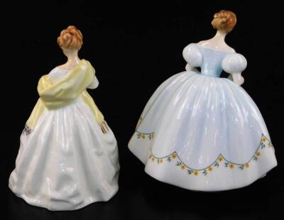 A Royal Worcester Doughty figure First Dance 3629, 16cm high, and a Royal Doulton figure First Dance HN2803, printed marks beneath. (2) - 2